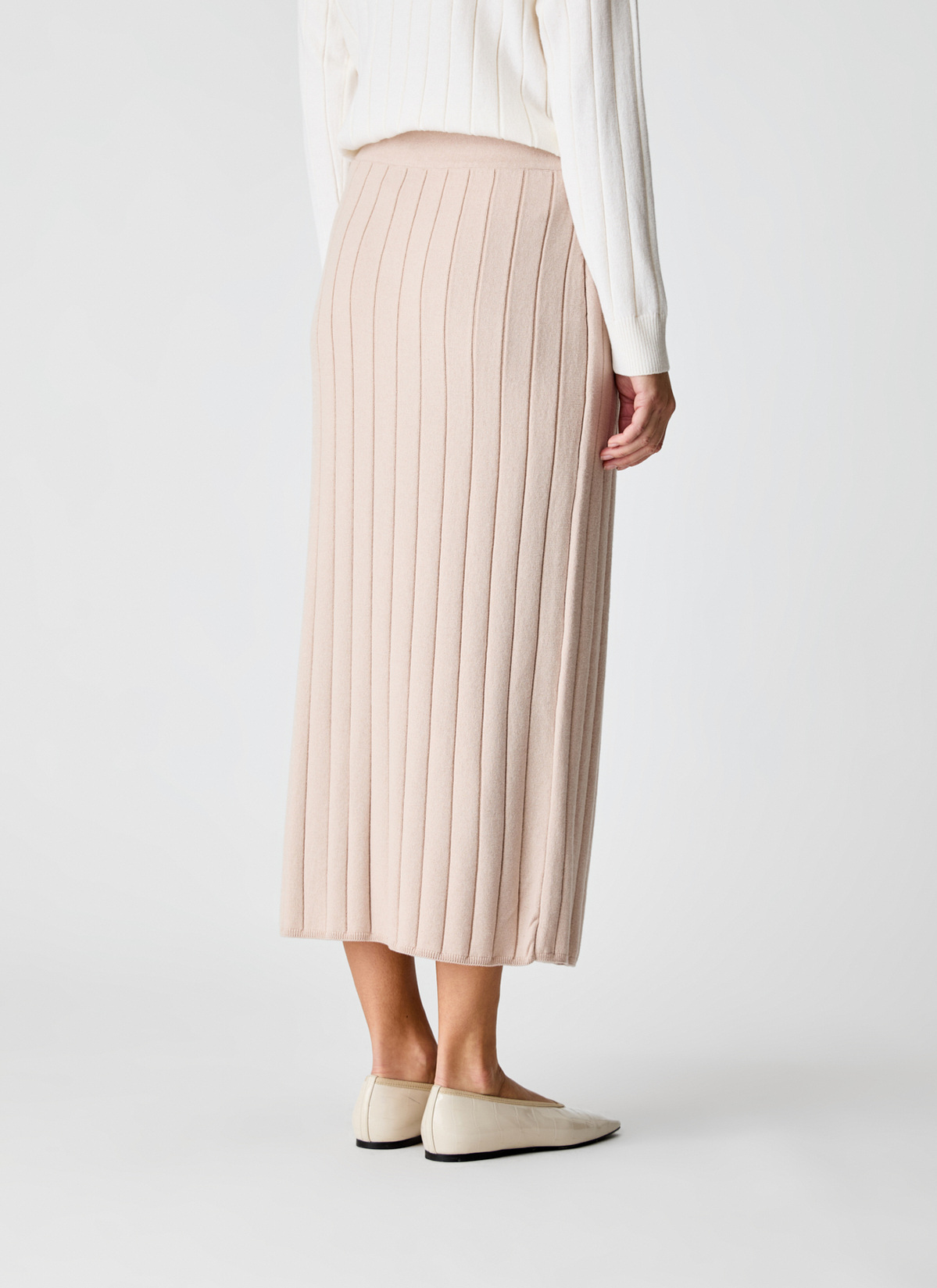 Rock, Sand Rückansicht